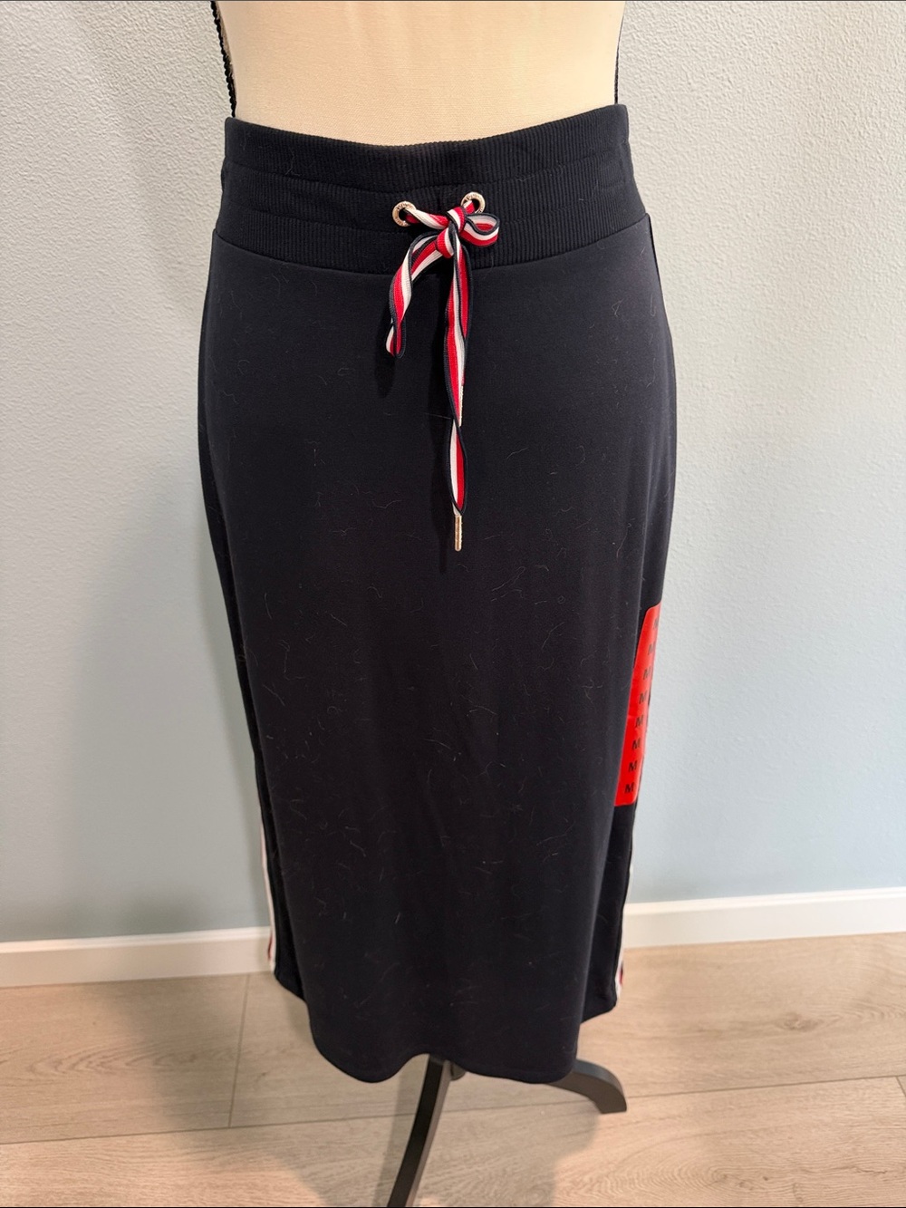 Tommy Hilfiger Black Midi Knit Skirt with Red Side Panel and Striped Drawstring